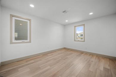 This beautifully renovated 6 bedroom 4 bath modern chic duplex on Ocean City Muni Golf Course in New Jersey - for sale on GolfHomes.com, golf home, golf lot