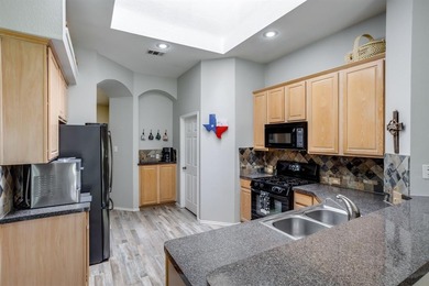 ASSUMABLE loan option for qualified buyers. Tucked inside the on Woodbridge Golf Club in Texas - for sale on GolfHomes.com, golf home, golf lot