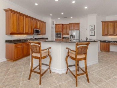 Discover the pinnacle of luxury living in this stunning WCI on Venetian Golf and River Club in Florida - for sale on GolfHomes.com, golf home, golf lot