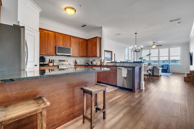 Enjoy the main lake views from spectacular corner condo in on The Golf Club at Cuscowilla in Georgia - for sale on GolfHomes.com, golf home, golf lot