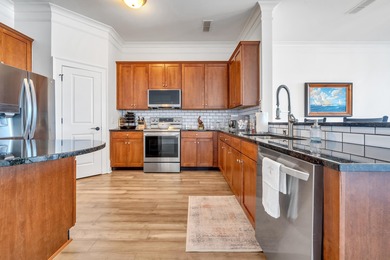 Enjoy the main lake views from spectacular corner condo in on The Golf Club at Cuscowilla in Georgia - for sale on GolfHomes.com, golf home, golf lot