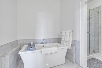 Enjoy the main lake views from spectacular corner condo in on The Golf Club at Cuscowilla in Georgia - for sale on GolfHomes.com, golf home, golf lot