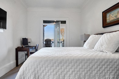 Enjoy the main lake views from spectacular corner condo in on The Golf Club at Cuscowilla in Georgia - for sale on GolfHomes.com, golf home, golf lot