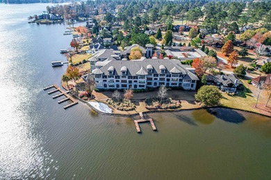 Enjoy the main lake views from spectacular corner condo in on The Golf Club at Cuscowilla in Georgia - for sale on GolfHomes.com, golf home, golf lot
