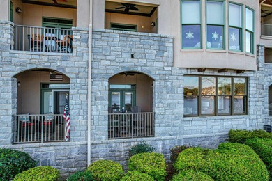 Enjoy the main lake views from spectacular corner condo in on The Golf Club at Cuscowilla in Georgia - for sale on GolfHomes.com, golf home, golf lot