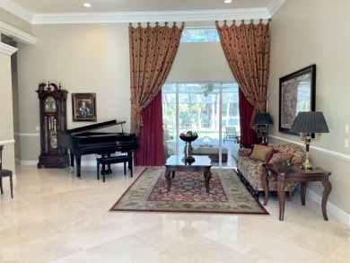 Casual elegance at its finest.  Located in the prestigious PGA on The Legacy Golf and Tennis Club in Florida - for sale on GolfHomes.com, golf home, golf lot
