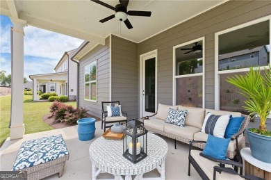 Nestled in the sought-after Traditions of Braselton community on Traditions of Braselton Golf Club in Georgia - for sale on GolfHomes.com, golf home, golf lot