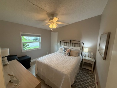 This beautiful 2-bedroom, 2-bathroom Palm Harbor home is being on Del Tura Golf and Country Club in Florida - for sale on GolfHomes.com, golf home, golf lot
