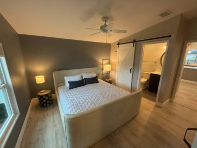 This beautiful 2-bedroom, 2-bathroom Palm Harbor home is being on Del Tura Golf and Country Club in Florida - for sale on GolfHomes.com, golf home, golf lot