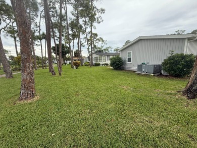 This beautiful 2-bedroom, 2-bathroom Palm Harbor home is being on Del Tura Golf and Country Club in Florida - for sale on GolfHomes.com, golf home, golf lot
