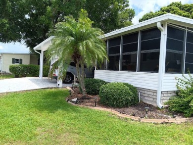 Tremendous 3-bedroom 2-bath located on the 9th fairway at Four on Four Lakes Golf Club in Florida - for sale on GolfHomes.com, golf home, golf lot