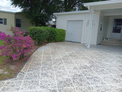 Tremendous 3-bedroom 2-bath located on the 9th fairway at Four on Four Lakes Golf Club in Florida - for sale on GolfHomes.com, golf home, golf lot