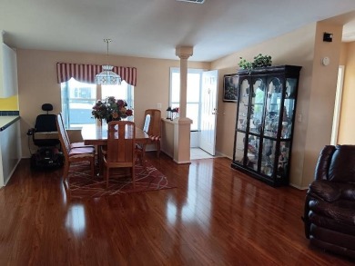 Tremendous 3-bedroom 2-bath located on the 9th fairway at Four on Four Lakes Golf Club in Florida - for sale on GolfHomes.com, golf home, golf lot