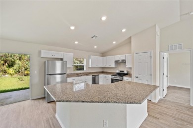 NEW CONSTRUCTION! MOVE-IN-READY! GREAT INVESTMENT OPPORTUNITY OR on Port Charlotte Golf Club in Florida - for sale on GolfHomes.com, golf home, golf lot