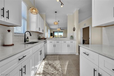 Stunning TOP fl END unit with plenty of windows to welcome the on Legends Golf and Country Club in Florida - for sale on GolfHomes.com, golf home, golf lot