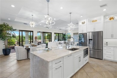 Stunning lake and golf course views in prestigious Marsala on Tiburon Golf Club in Florida - for sale on GolfHomes.com, golf home, golf lot