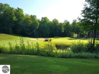 This furnished ground level suite is an ideal spot to enjoy all on Cedar River Golf Course in Michigan - for sale on GolfHomes.com, golf home, golf lot