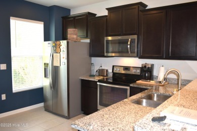 This beautifully designed unit is a true gem, AND A HUGE $$$ on Carolina Shores Golf Course in North Carolina - for sale on GolfHomes.com, golf home, golf lot
