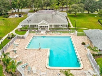 Welcome to this charming two-bedroom, two-bath Villa nestled in on Meadow Oaks Golf and Country Club in Florida - for sale on GolfHomes.com, golf home, golf lot