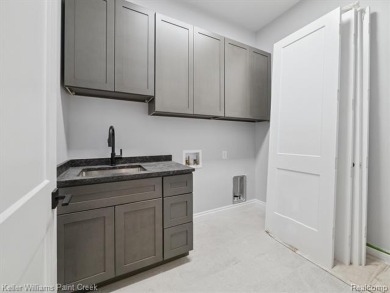 THIS HOME IS BUILT AS SHOWN IN PICS (sans the flooring) and on Metamora Country Club in Michigan - for sale on GolfHomes.com, golf home, golf lot