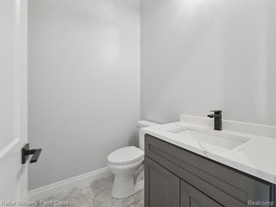 THIS HOME IS BUILT AS SHOWN IN PICS (sans the flooring) and on Metamora Country Club in Michigan - for sale on GolfHomes.com, golf home, golf lot