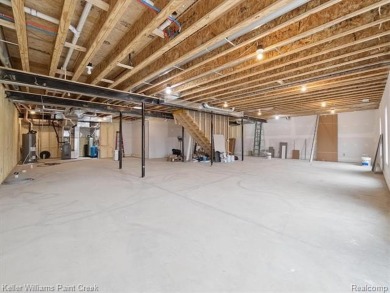 THIS HOME IS BUILT AS SHOWN IN PICS (sans the flooring) and on Metamora Country Club in Michigan - for sale on GolfHomes.com, golf home, golf lot