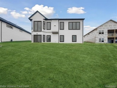 THIS HOME IS BUILT AS SHOWN IN PICS (sans the flooring) and on Metamora Country Club in Michigan - for sale on GolfHomes.com, golf home, golf lot