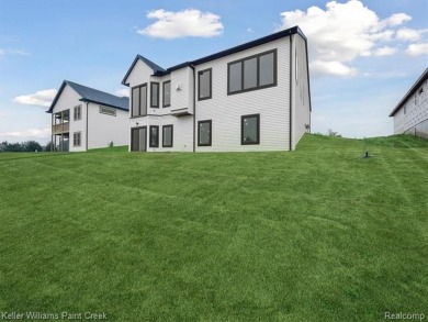 THIS HOME IS BUILT AS SHOWN IN PICS (sans the flooring) and on Metamora Country Club in Michigan - for sale on GolfHomes.com, golf home, golf lot