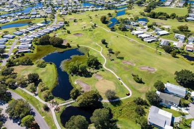 Beautiful 3-bedroom, 2 bath home on the golf course. New A/C on Savanna Golf Club in Florida - for sale on GolfHomes.com, golf home, golf lot