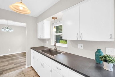Welcome to this beautifully updated 2-bedroom, 1.5-bath home on Highland Lakes Executive Golf Course in Florida - for sale on GolfHomes.com, golf home, golf lot
