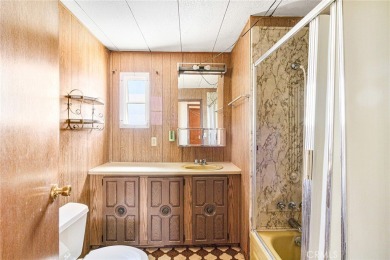 This 3-bedroom, 2-bath home offers 1,380 sq ft on a 6,811 sq ft on Green Tree Golf Course in California - for sale on GolfHomes.com, golf home, golf lot