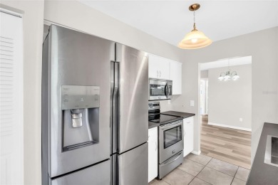 Welcome to this beautifully updated 2-bedroom, 1.5-bath home on Highland Lakes Executive Golf Course in Florida - for sale on GolfHomes.com, golf home, golf lot