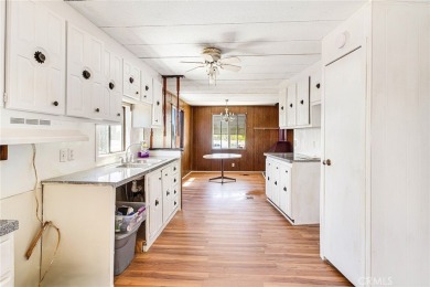 This 3-bedroom, 2-bath home offers 1,380 sq ft on a 6,811 sq ft on Green Tree Golf Course in California - for sale on GolfHomes.com, golf home, golf lot