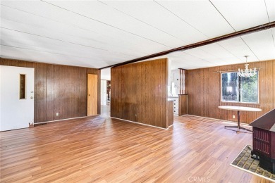 This 3-bedroom, 2-bath home offers 1,380 sq ft on a 6,811 sq ft on Green Tree Golf Course in California - for sale on GolfHomes.com, golf home, golf lot