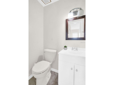 Welcome to this beautifully updated 2-bedroom, 1.5-bath home on Highland Lakes Executive Golf Course in Florida - for sale on GolfHomes.com, golf home, golf lot