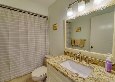 Escape the cold and enjoy easy, carefree Florida living in this on The Meadows Golf and Country Club in Florida - for sale on GolfHomes.com, golf home, golf lot