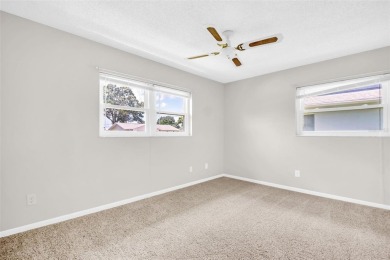 Welcome to this beautifully updated 2-bedroom, 1.5-bath home on Highland Lakes Executive Golf Course in Florida - for sale on GolfHomes.com, golf home, golf lot