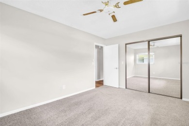 Welcome to this beautifully updated 2-bedroom, 1.5-bath home on Highland Lakes Executive Golf Course in Florida - for sale on GolfHomes.com, golf home, golf lot
