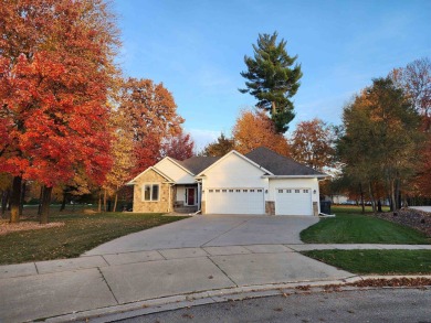 This stunning 4-bedroom, 3-bath home offers luxury living right on Foxfire Golf Club in Wisconsin - for sale on GolfHomes.com, golf home, golf lot