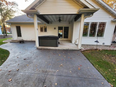 This stunning 4-bedroom, 3-bath home offers luxury living right on Foxfire Golf Club in Wisconsin - for sale on GolfHomes.com, golf home, golf lot