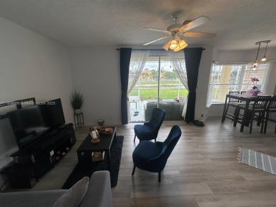 Beautiful lakefront single-family home in the sought-after Grand on Palm Beach Polo and Country Club in Florida - for sale on GolfHomes.com, golf home, golf lot
