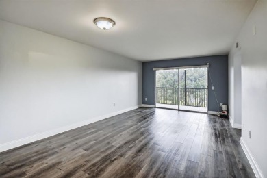 Beautifully Renovated, Spacious 2-Bed/2-Bath, Garden/pool area on Flamingo Lakes Country Club in Florida - for sale on GolfHomes.com, golf home, golf lot