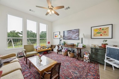 Discover refined living in this immaculate four-bedroom on Lantana Golf Club in Texas - for sale on GolfHomes.com, golf home, golf lot