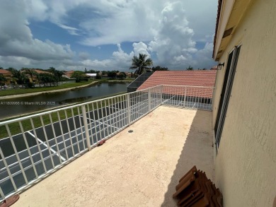 Beautiful lakefront single-family home in the sought-after Grand on Palm Beach Polo and Country Club in Florida - for sale on GolfHomes.com, golf home, golf lot