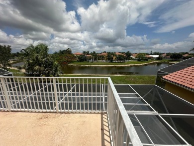 Beautiful lakefront single-family home in the sought-after Grand on Palm Beach Polo and Country Club in Florida - for sale on GolfHomes.com, golf home, golf lot