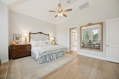 Discover refined living in this immaculate four-bedroom on Lantana Golf Club in Texas - for sale on GolfHomes.com, golf home, golf lot