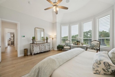 Discover refined living in this immaculate four-bedroom on Lantana Golf Club in Texas - for sale on GolfHomes.com, golf home, golf lot