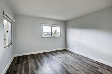 Beautifully Renovated, Spacious 2-Bed/2-Bath, Garden/pool area on Flamingo Lakes Country Club in Florida - for sale on GolfHomes.com, golf home, golf lot