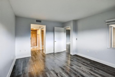 Beautifully Renovated, Spacious 2-Bed/2-Bath, Garden/pool area on Flamingo Lakes Country Club in Florida - for sale on GolfHomes.com, golf home, golf lot