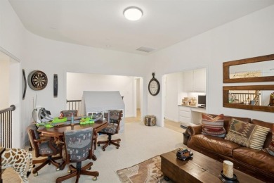 Discover refined living in this immaculate four-bedroom on Lantana Golf Club in Texas - for sale on GolfHomes.com, golf home, golf lot